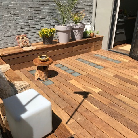 Installing wooden decking boards using invisible clips and screws