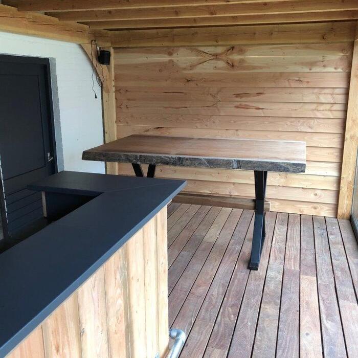 Luxury Ipe hardwood decking boards used as an interior floor for a modern garden room or summerhouse